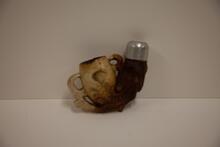 [Carved ivory pipe]