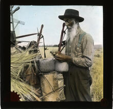 [Man winding twine]