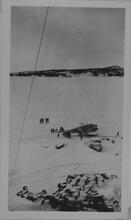 [Airplane CF-BMW on skis on frozen lake]