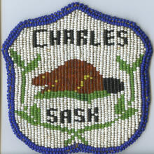 Charles Sask [hand-beaded badge]