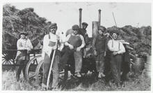 Unidentified Men in Front of Thresher