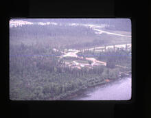 [Settlement next to a lake]