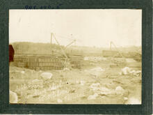 Unloading steel for railway bridge west of Battleford, N.W.T., 1905