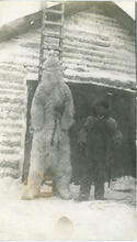 Native with polar bear, n.d.