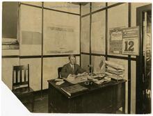 Realtor Udo Schrader at his desk
