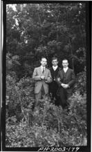 Three young men in suits