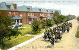 Detachment of police passing officers' quarters in Regina barracks after the exercise ride, Regina, Sask.