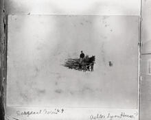 [Man driving sleigh]
