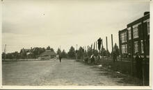 [Constructing tennis court fence at Bedford Road Collegiate]