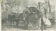 A buggy and two men (W. and C. Couper)