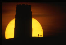 Sun setting behind St. Michael's Tower