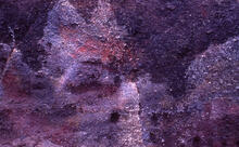 Reddish coloured lava quarry