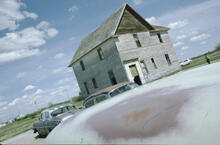 House with car detail