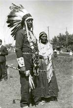 Tribesmen at Great Plains Encampment, Man and Women